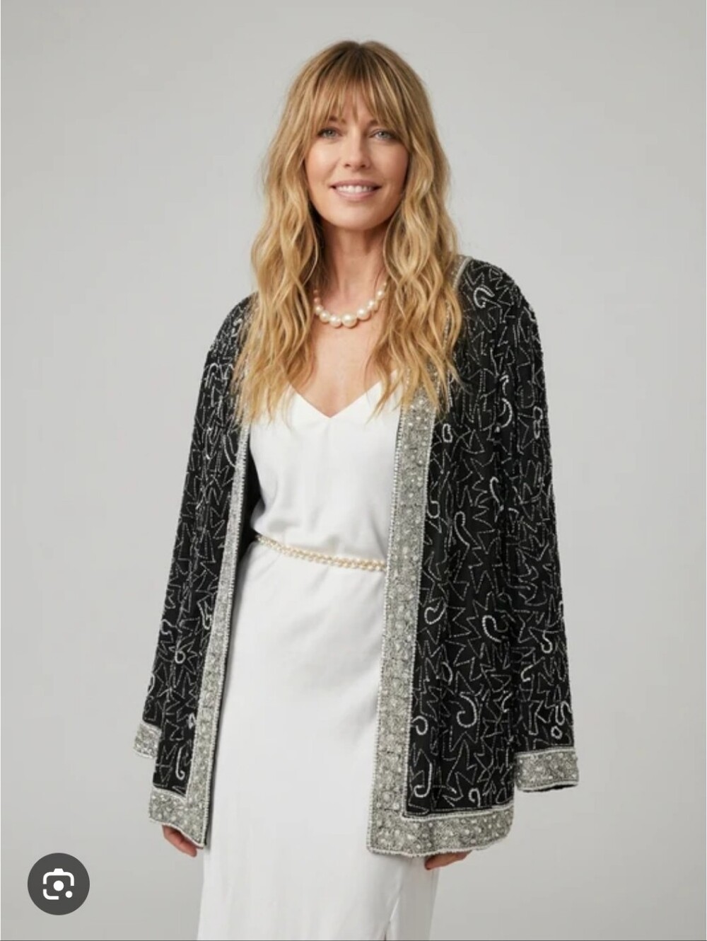 vintage Laurence Kazar cocktail jacket made of black silk with intricate silver